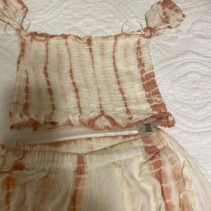 Crop top and palazzo pants.